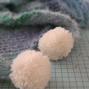 Cozy Blue and Green Scarf with Pom Poms